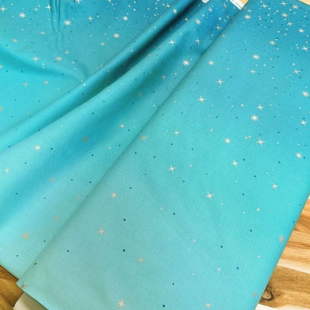 100% Cotton - Fairy Dust Turquoise (209) - Ombre with Silver Metallic Stars by Moda per 1/2m